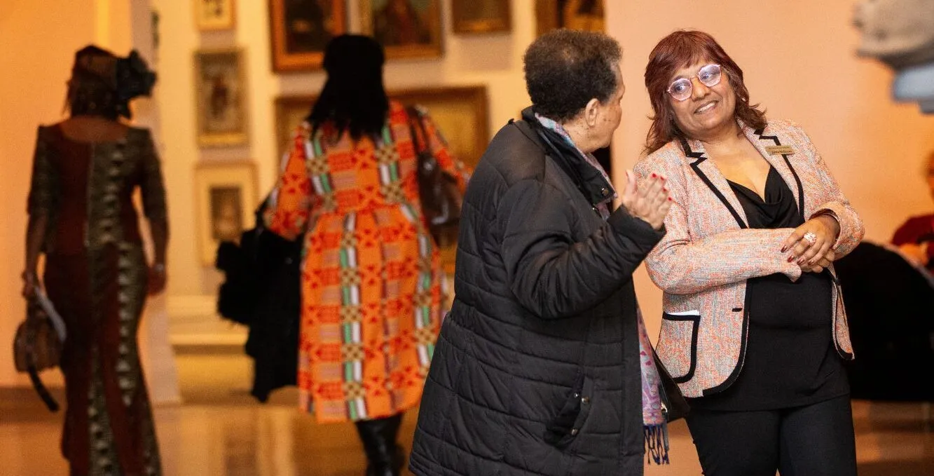 Image of two people in the Museum London galleries