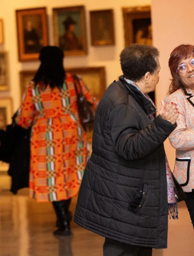 Image of two people in the Museum London galleries
